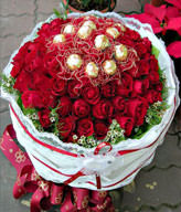 50 red roses and Ferrero Rocher 12